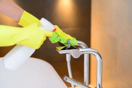 Cleaner preparing a Finchley rental property for final inspection