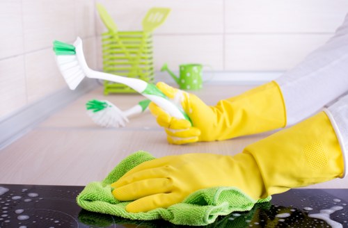 Detailed post-construction cleaning in a Finchley kitchen after renovation work