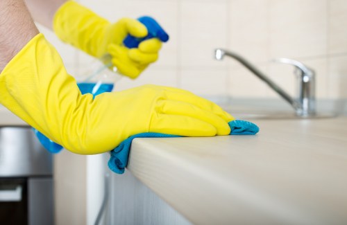 Local oven cleaner working in a Finchley kitchen with access considerations