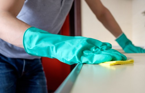 Upholstery cleaning equipment used on a fabric sofa in Finchley